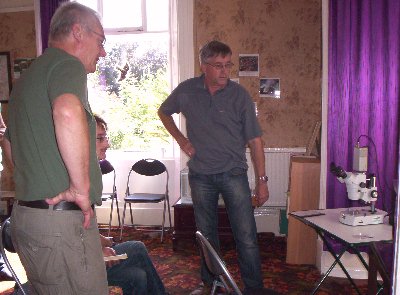 Paul and&nbsp;Paul discuss the video microscope.